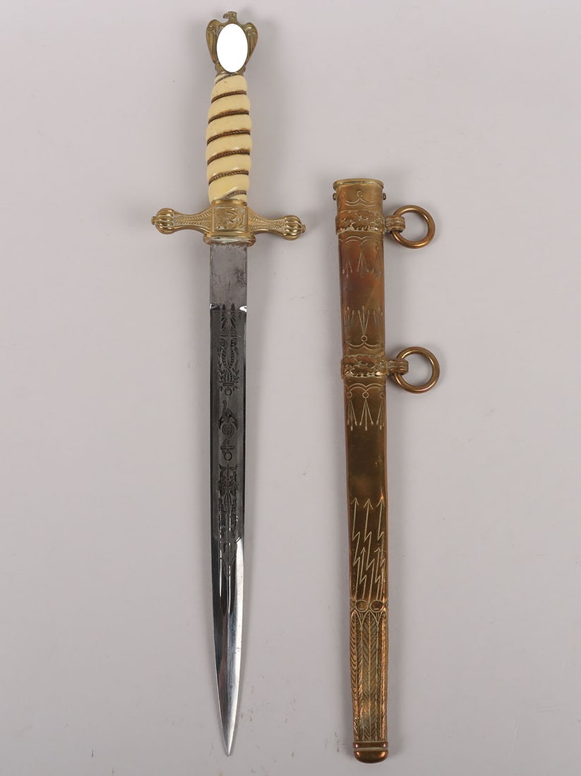 WW2 German Kriegsmarine Officers Dress Dagger by Carl Eickhorn, Solingen: WW2 German Kriegsmarine Officers Dress Dagger by Carl Eickhorn, Solingen, example with white celluloid grip having the wire binding. Gilt eagle pommel top and cross guard with fouled anchor and press