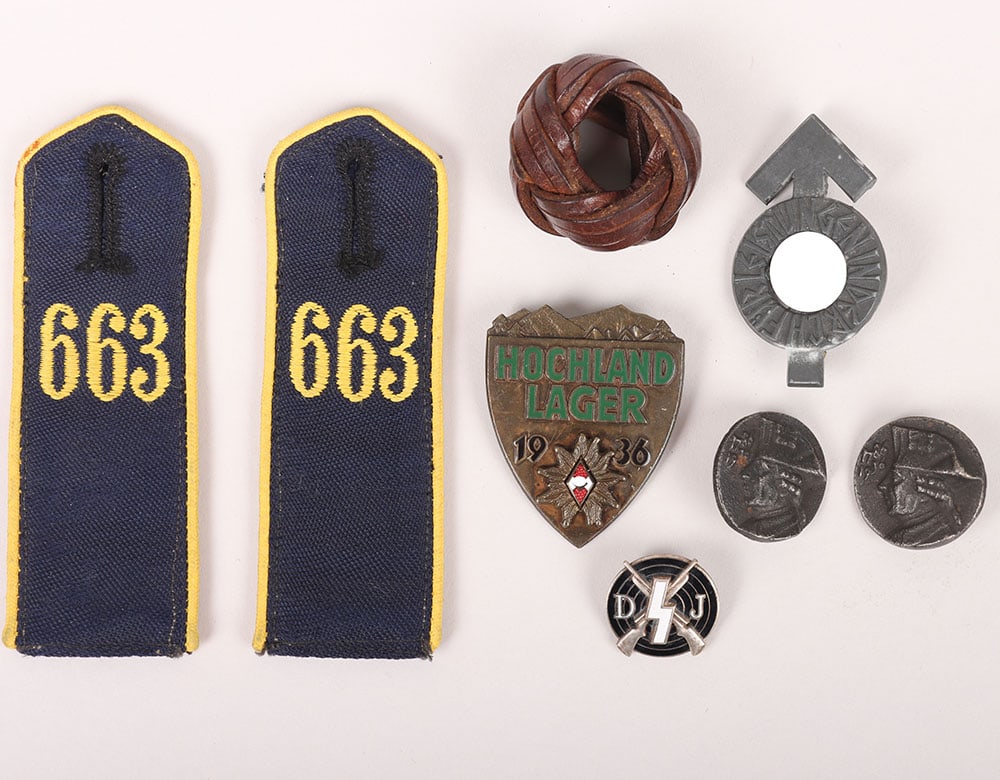 Small Hitler Youth (Hitlerjugend) Grouping: Small Hitler Youth (Hitlerjugend) Grouping, lot containing a pair of HJ shoulder boards with embroidered unit “663”, leather scarf knot, stickpins and HJ Proficiency badge. All in good conditi