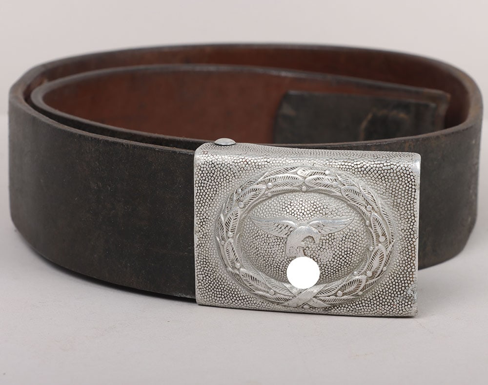 WW2 German Luftwaffe Belt & Buckle by Unknown Maker: WW2 German Luftwaffe Belt & Buckle by Unknown Maker, aluminium, one piece constructed buckle. Leather tongue maker marking and date 1936 with extra LBA and Luftnachrichten marking. Belt size 85 with m