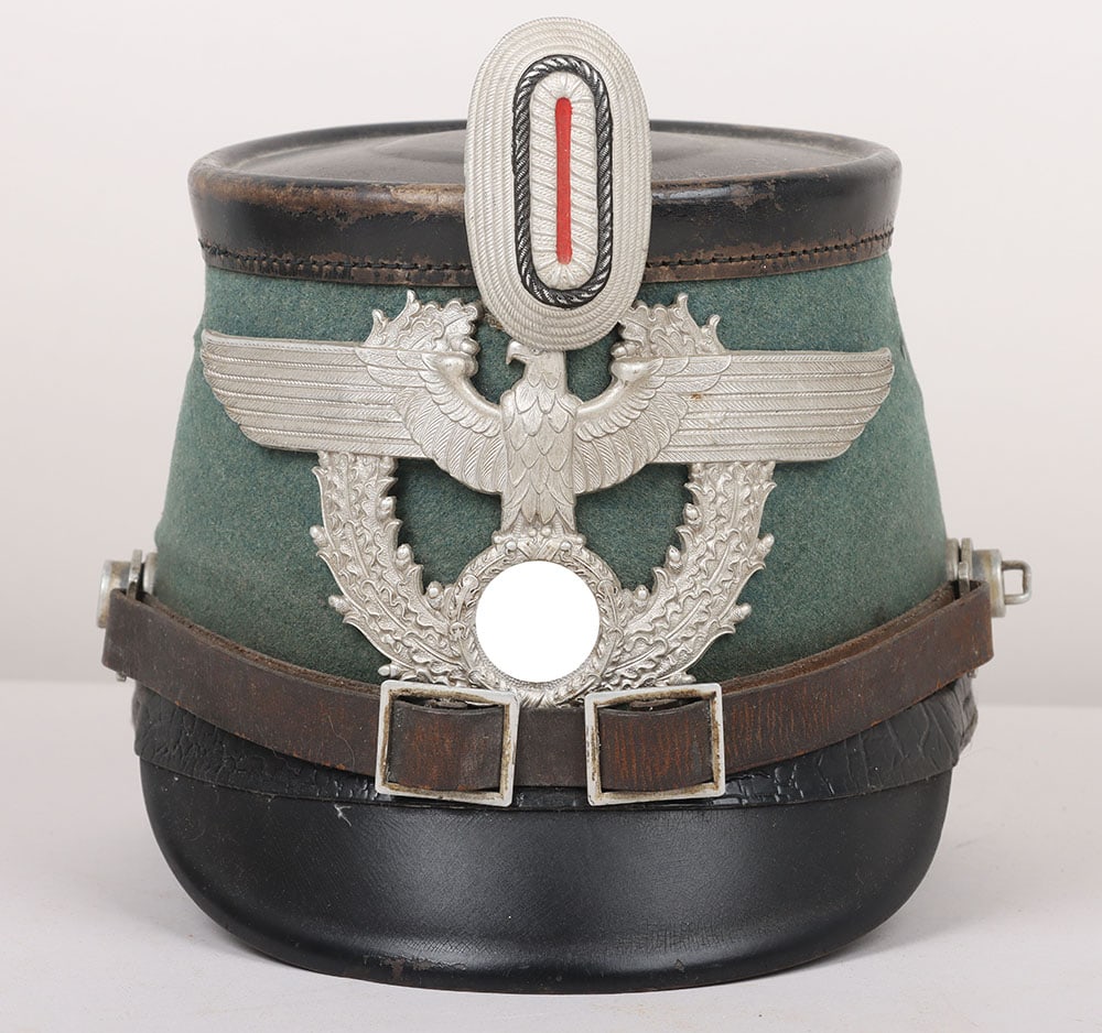 WW2 German Police (Polizei) Other Ranks Shako by Hans Römer, Ülm: WW2 German Police (Polizei) Other Ranks Shako by Hans Römer, Ülm, good condition with light signs of age. Maker marked inside. Leather of both the interior and sweat band in good condition. Front al