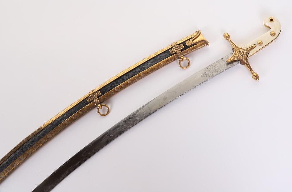 ^ Early Victorian Officers Mameluke Sword of the 14th Kings Hussars: ^ Early Victorian Officers Mameluke Sword of the 14th Kings Hussars, fine example with two piece ivory grips with gilt metal mounts. Curved blade with etched crowned regimental title and ?PROSSER to t