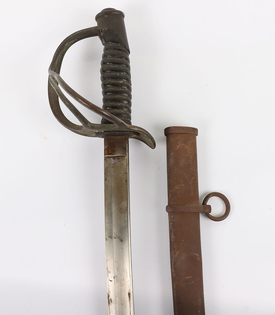 U.S. Model 1860 Cavalry Sword: U.S. Model 1860 Cavalry Sword, ricasso is mkd. ?ROBY & CO.? (can?t make any more out), the dark leather grip is well worn & lacks its wire, brass guard has a pleasing dark patina, its blade is very cl