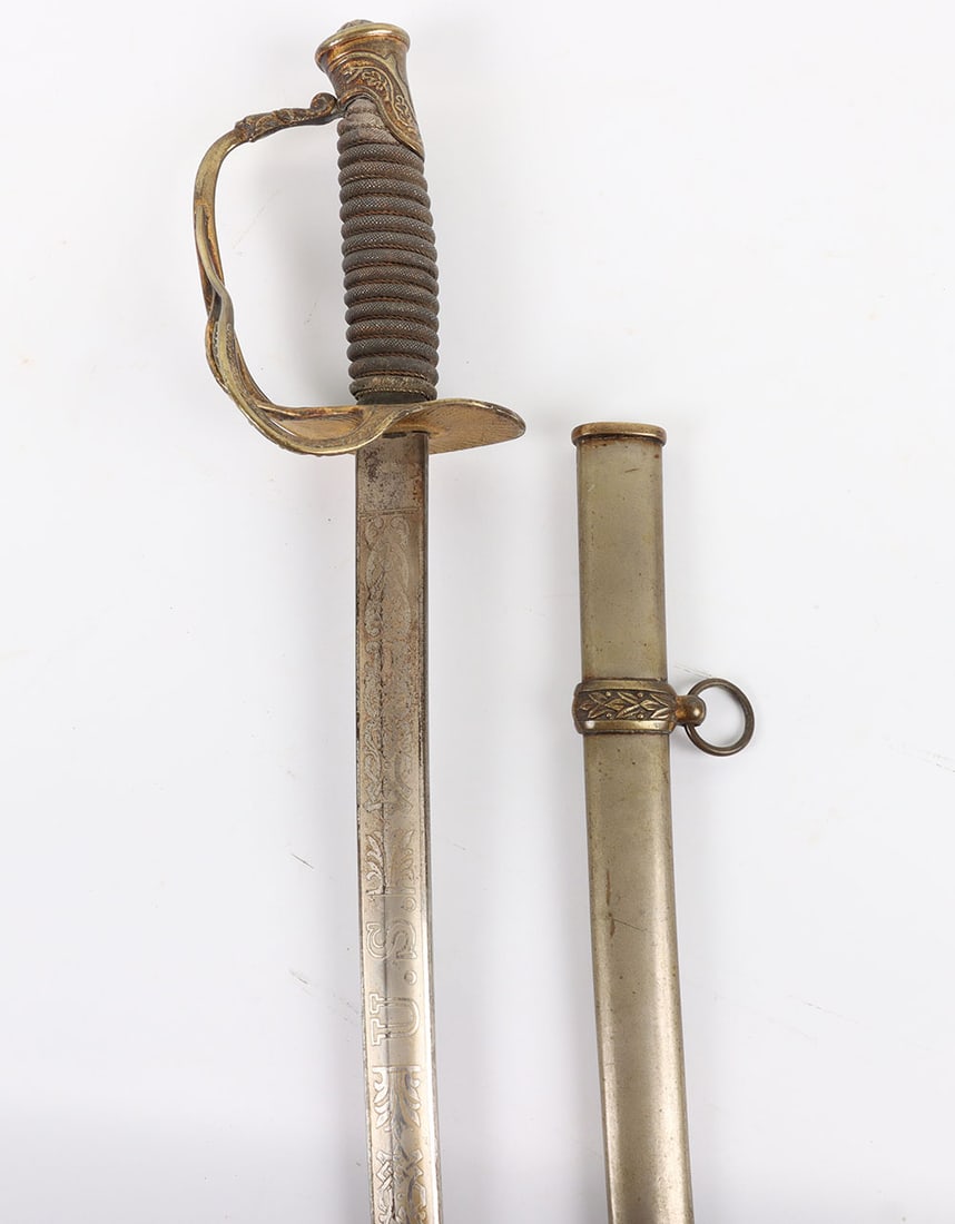 U.S. Model 1872 Cavalry Officers Sword: U.S. Model 1872 Cavalry Officers Sword, for Indian War use, sharkskin grip w/ brass wire wrap, the 3 branch brass guard is damaged & loose (has eagle design), double engraved blade w/ bear logo (Abrah