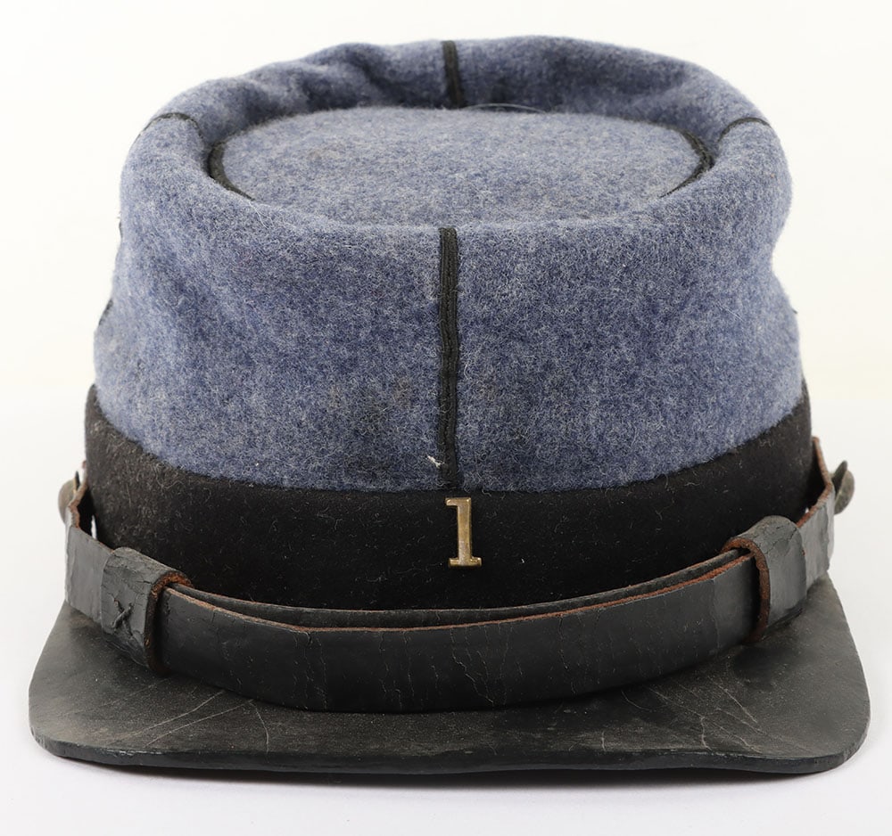 American Civil War Period Re-Worked Union Kepi: American Civil War Period Re-Worked Union Kepi, New York State, in my opinion the grey & black wool top are newer while the black polished cotton liner is civil war period along w/ its dark leather vi