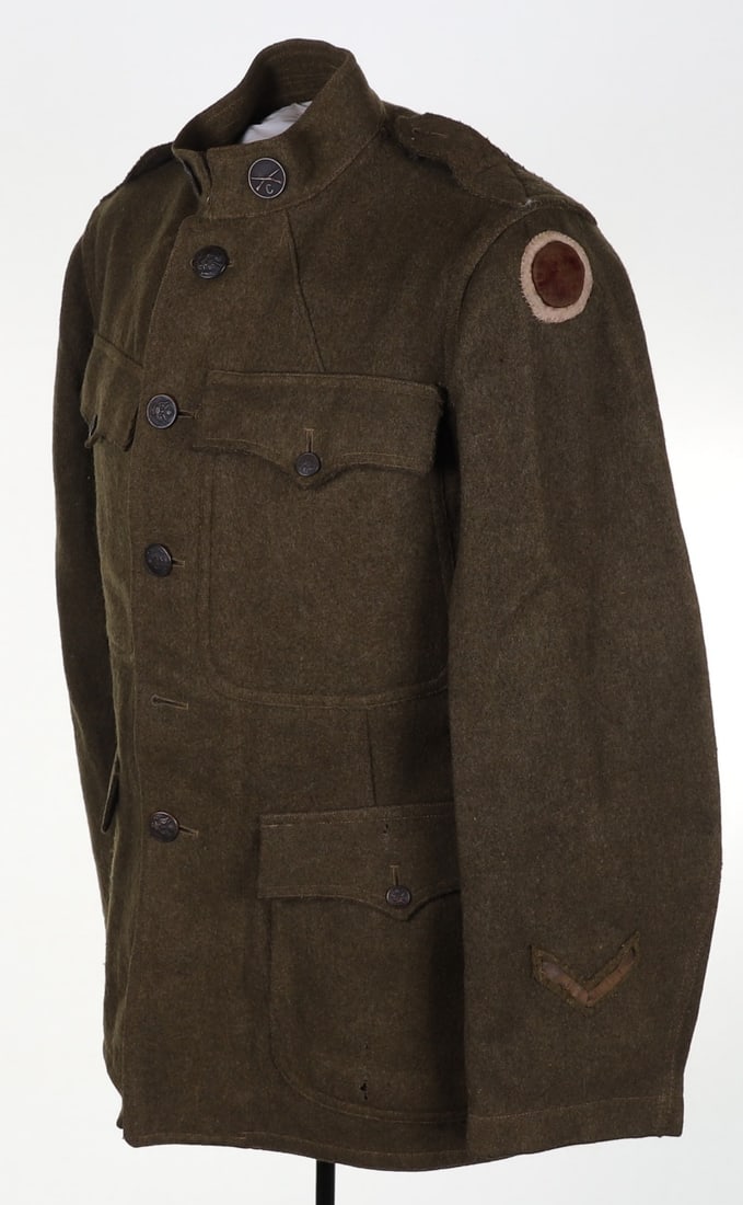 WW1 American 37th Infantry Division Tunic: WW1 American 37th Infantry Division Tunic, four pocket khaki wool tunic with American eagle tunic buttons. Fine two piece made patch to the arm an service chevrons to the lower sleeve. Generally good 