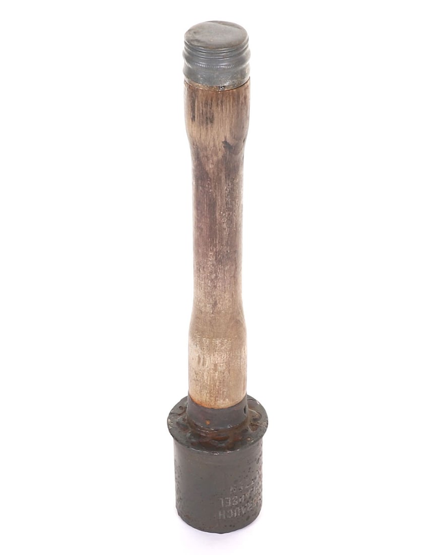 Inert WW2 German Stick Grenade: Inert WW2 German Stick Grenade, fine example with much of the stencilling remaining to the canister head. Wooden haft stamped with ?42 gck?. Metal cap to the bottom, revealing the original pull string