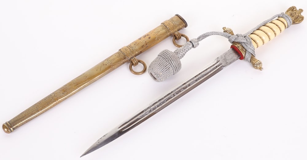 WW2 German Kriegsmarine Officers Dress Dagger by E&F Horster, Solingen: WW2 German Kriegsmarine Officers Dress Dagger by E&F Horster, Solingen, good untouched example with white celluloid grip having wire binding. Gilt metal Kriegsmarine eagle pommel and cross guard with