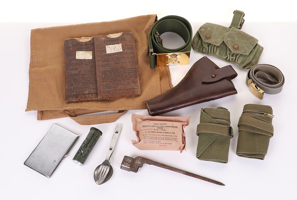 British Military Equipment: British Military Equipment, consisting of open top holster, webbing ammunition pouches, gas eye shields, EIIR Royal Regiment of Scotland waist belt, plus other items.