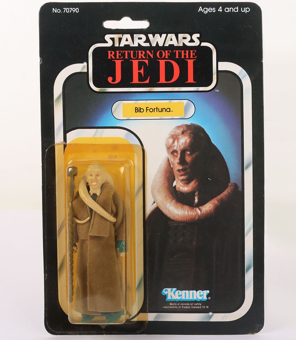 Vintage Kenner Star Wars Return of The Jedi Bib Fortuna Unpunched Action Figure.: Vintage Kenner Star Wars Return of The Jedi Bib Fortuna Original Carded Moc Unpunched Action Figure. Product no. 70790. 3 ¾ inches, Yellowed sealed bubble. Some minor edge wear and veining bend