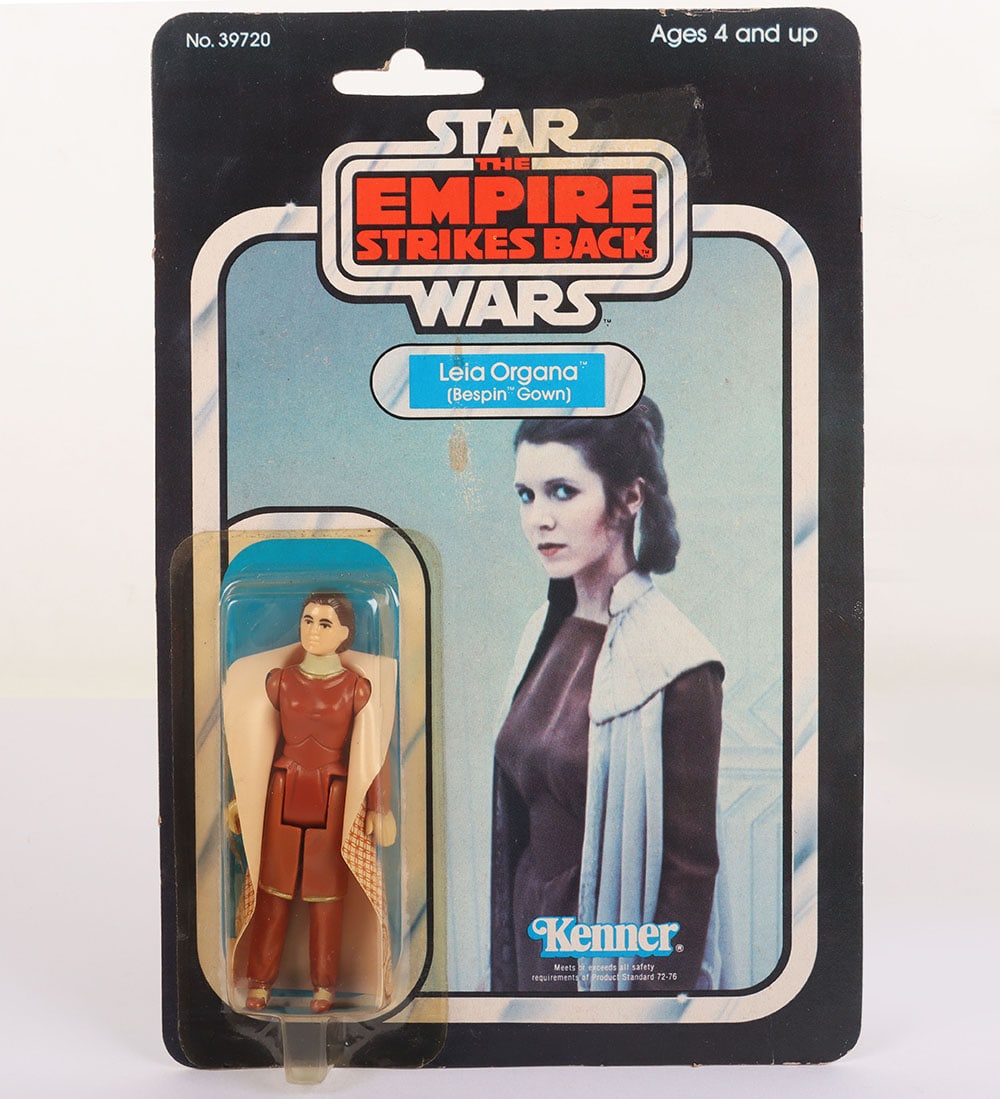 Vintage Star Wars The Empire Strikes Back Leia Organa (Bespin Gown) Action Figure Kenner.: Vintage Star Wars The Empire Strikes Back Leia Organa (Bespin Gown) Original Carded Moc Action Figure Kenner. Product no. 39720. Factory sealed yellow bubble. Some edge wear and a mark in the middle o