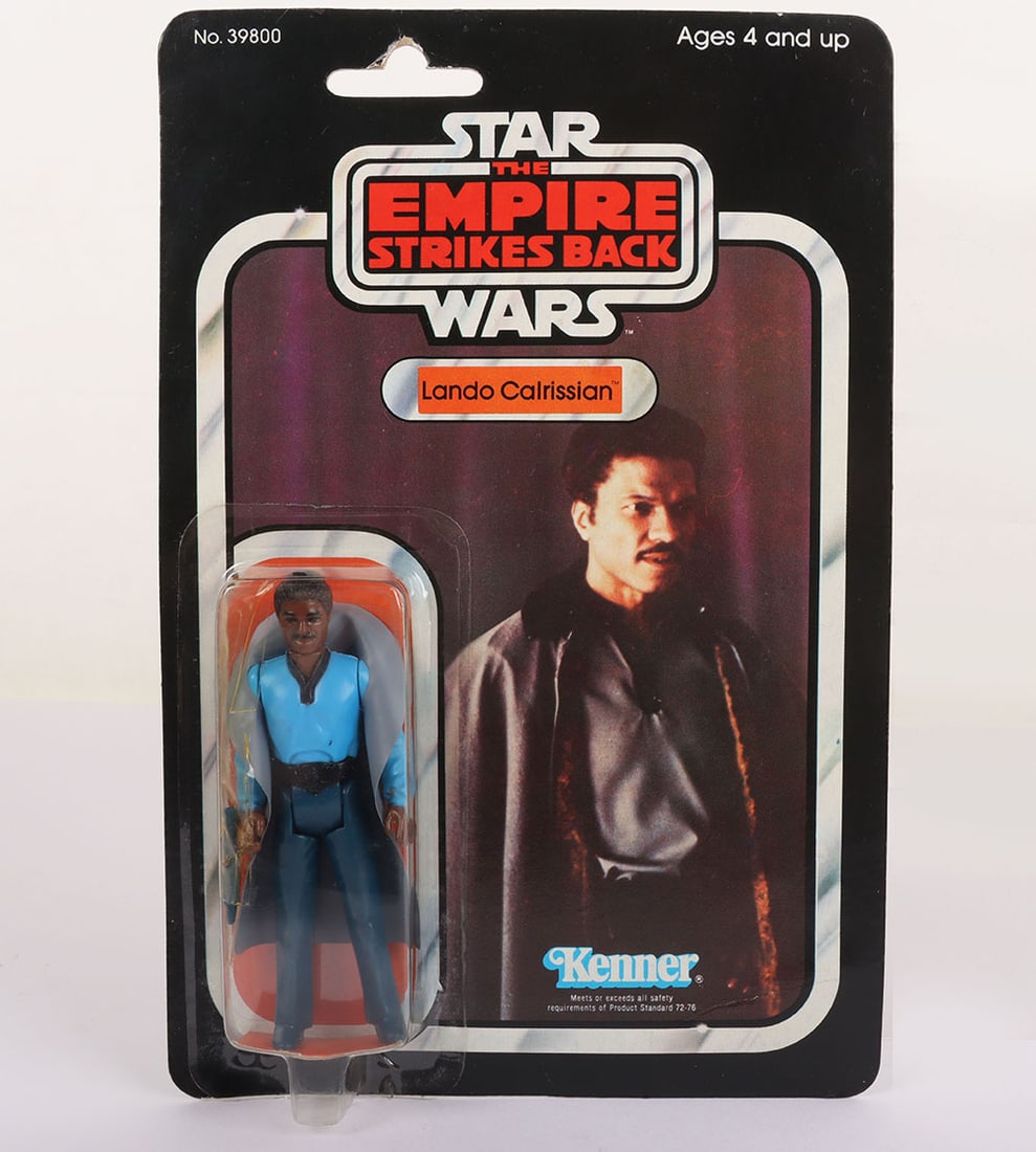 Vintage Star Wars The Empire Strikes Back Lando Calrissian Action Figure Kenner.: Vintage Star Wars The Empire Strikes Back Lando Calrissian (No Teeth) Original Carded Moc Action Figure Kenner. Product no. 39800. Factory sealed clear bubble. Some creasing to the corner opposite the