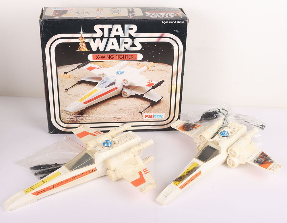 Two Vintage Star Wars X-Wing Fighter Palitoy Vehicles.: Two Vintage Star Wars X-Wing Fighter Palitoy Vehicles. Including a boxed Complete with original guns, missing instructions. Untested. Cardboard has been glued to the inside of the box. Also included i