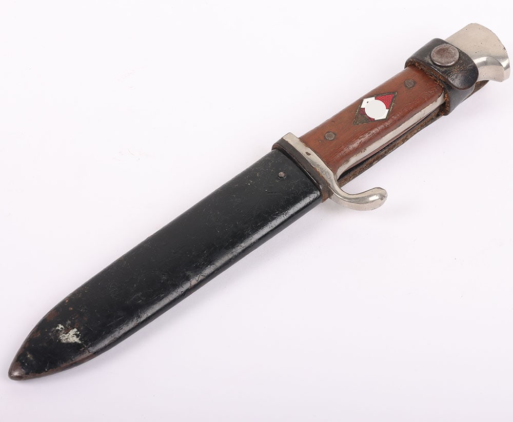 Third Reich Hitler Youth Boys Dagger: Third Reich Hitler Youth Boys Dagger: Grips having been replaced in wood with enamel HJ diamond insignia inserted, some enamel damage. Plated pommel top and cross guard. Housed in blackened scabbard w