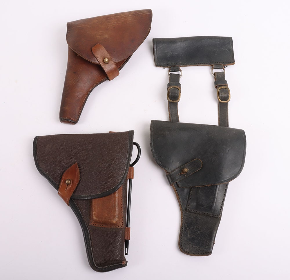 Three Soviet Russian Leather Pistol Holsters, Nagant, TT30/33: Three Soviet Russian Leather Pistol Holsters, Nagant, TT30/33, Three Soviet holsters, one a left handed Nagant holster, 1902 dated, in great condition for its age, along with a TT-30 drop down holster
