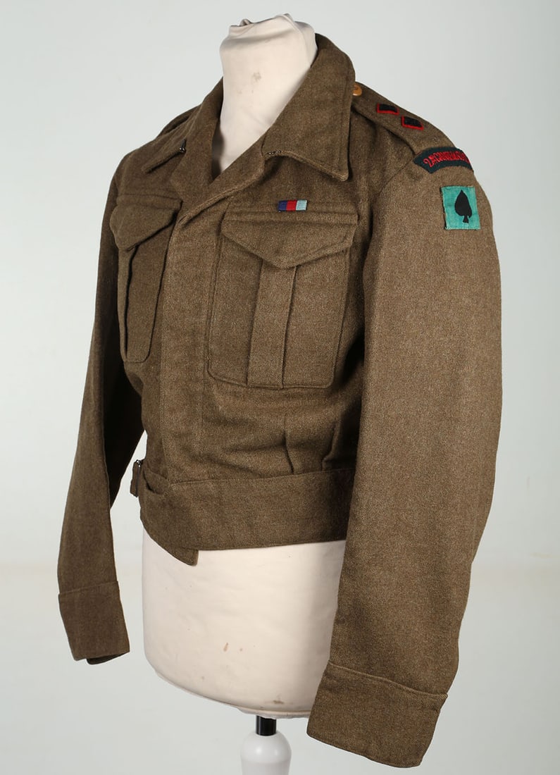 WW2 2nd Gurkha Rifles Officers Battle Dress Blouse: WW2 2 nd Gurkha Rifles Officers Battle Dress Blouse, fine example of an early khaki officers battle dress blouse with concealed button front. Red blacked black rank pips to the shoulders, embroidered