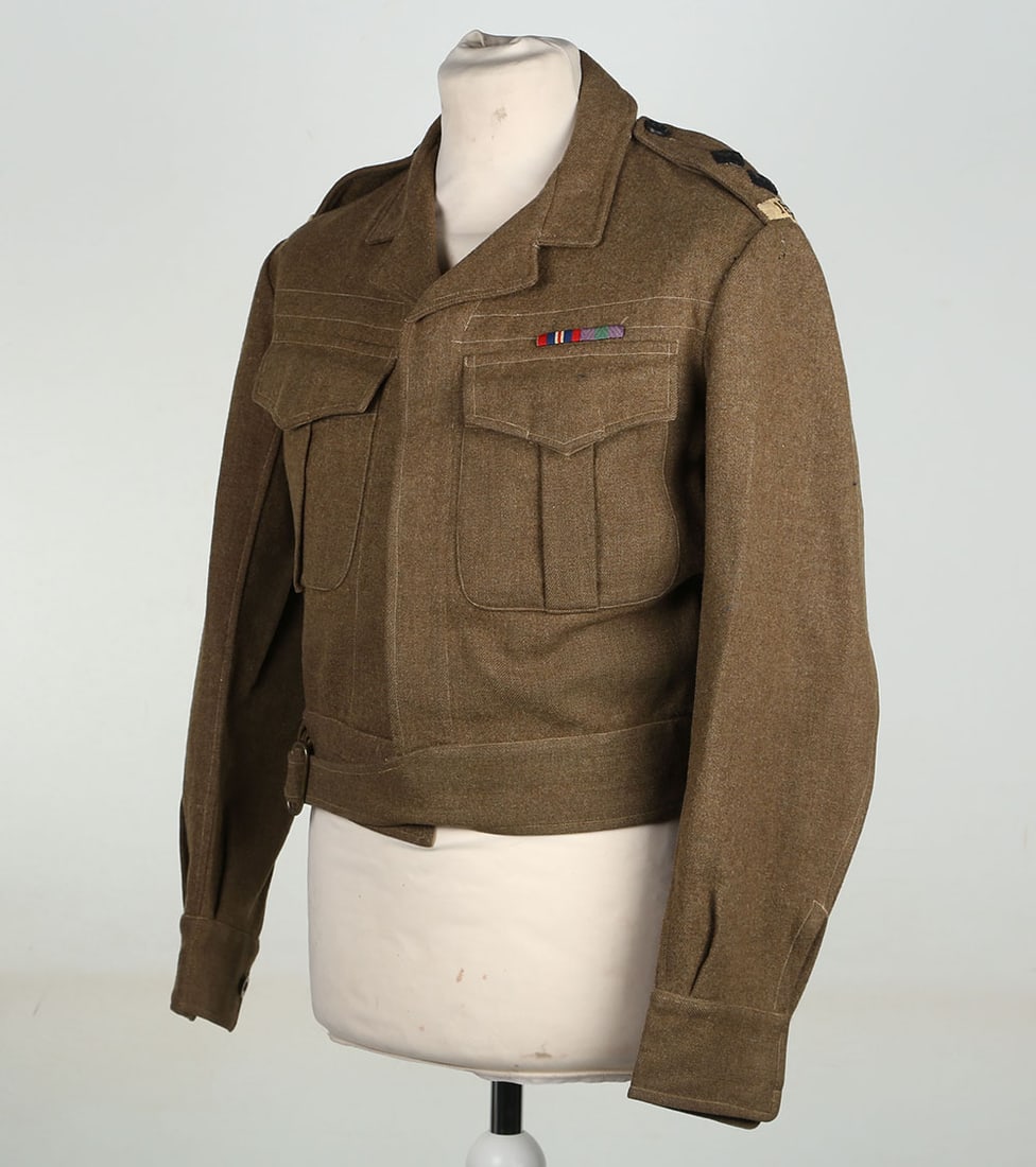 WW2 10th Gurkha Rifles Officers Battle Dress Blouse: WW2 10 th Gurkha Rifles Officers Battle Dress Blouse, fine example of a war aid battle dress blouse with concealed button front and pockets. Shoulders with rifles pattern rank pips and cut stitched on