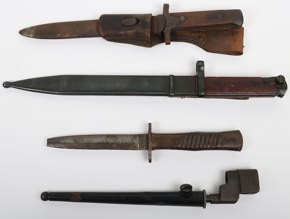 USSR SVT 40 Bayonet: USSR SVT 40 Bayonet: Russian bayonet for SVT 40 with metal scabbard and belt loop, WW2 Italian Carcano bayonet with scabbard and leather frog, spike bayonet and German fighting knife with broken tip. 