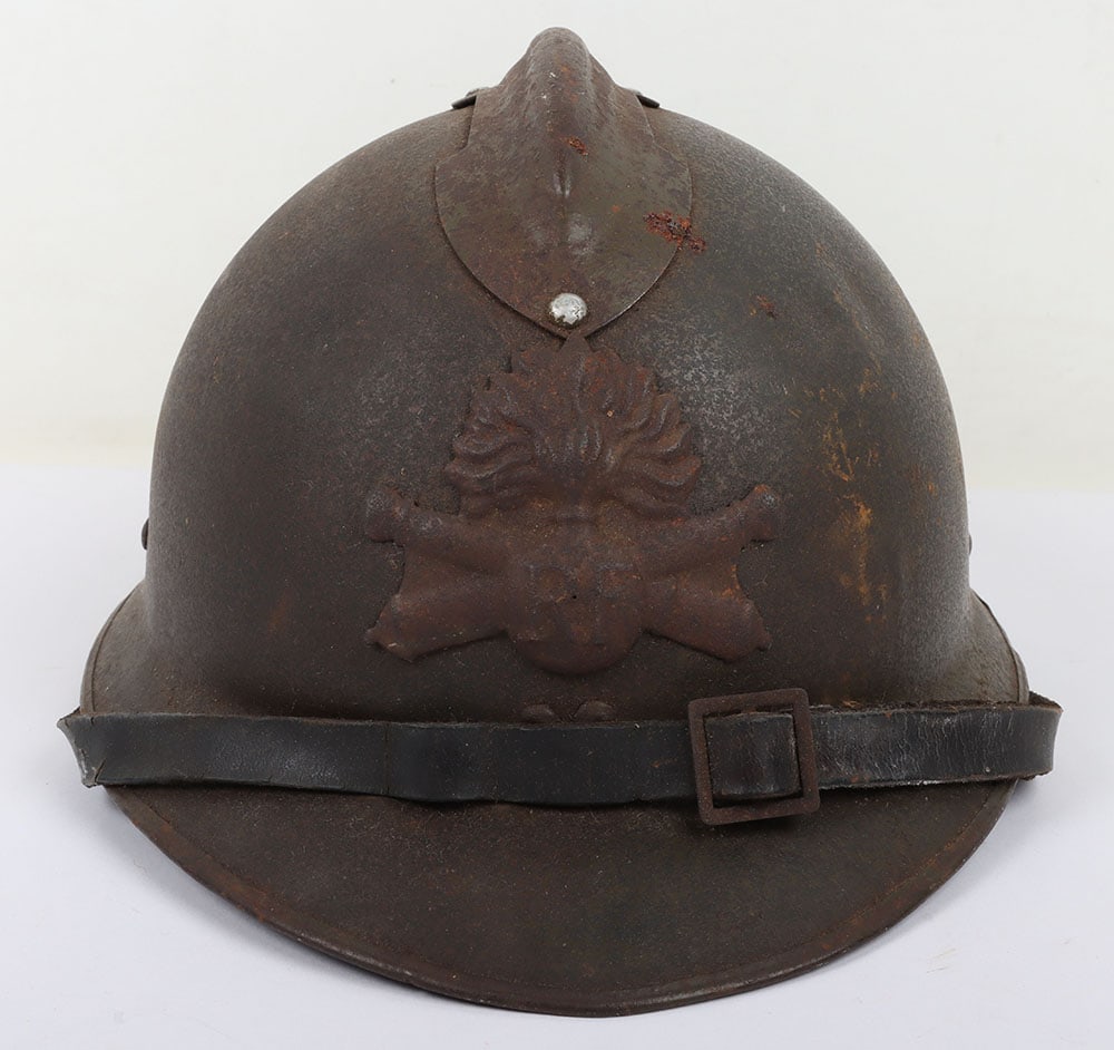 WW2 French Artillery Helmet: WW2 French Artillery Helmet: Artillery badge to front of helmet complete with black leather liner and chin strap.