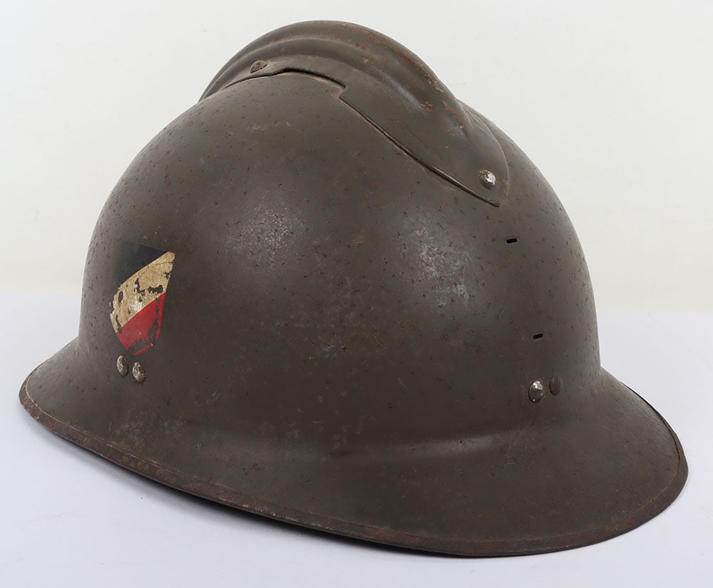 WW2 German Army Re-issue French Adrian Helmet: WW2 German Army Re-issue French Adrian Helmet: WW2 French issue green painted combat Adrian helmet with liner, front badge removed and double army decals to sides. We believe these to be later decals.