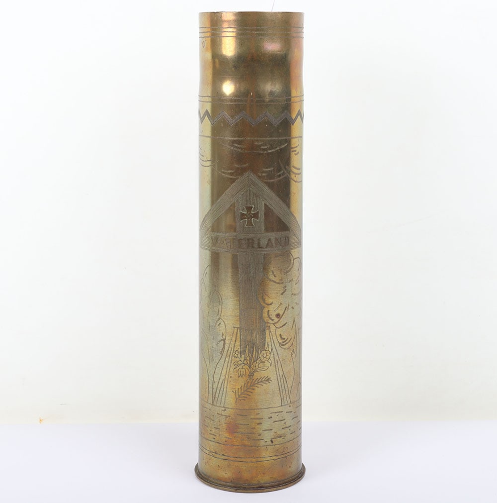 WW2 German Trench Art Shell, 1940: WW2 German Trench Art Shell, 1940, Nice, unusual example of a WW2 German trench art brass shell. Nicely decorated to the sides with a swastika within a sun, a German solder with tin helmet, marked 