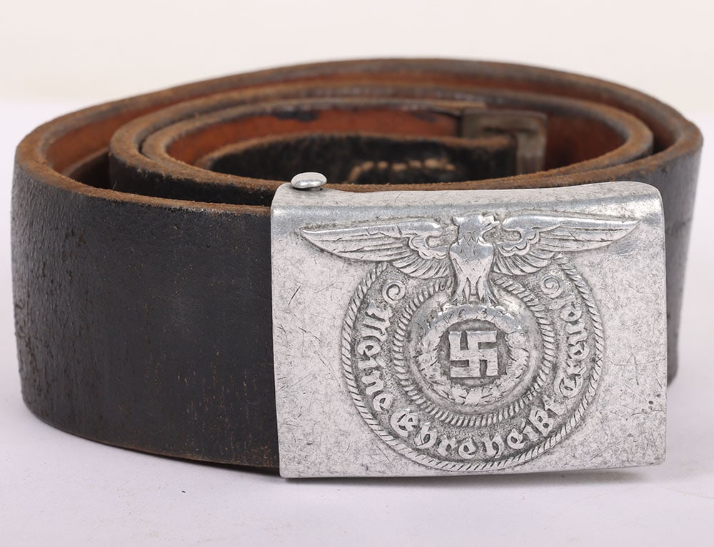 WW2 German Waffen-SS Other Ranks Combat Belt and Buckle: WW2 German Waffen-SS Other Ranks Combat Belt and Buckle, fine example of a leather combat belt with an original Waffen-SS other ranks buckle fitted. The reverse of the buckle is marked with RZM 822/38