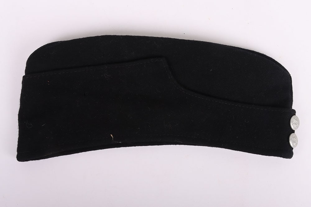 Third Reich NSKK Other Ranks Overseas / Side Cap: Third Reich NSKK Other Ranks Overseas / Side Cap, black wool other ranks cap with aluminium NSKK buttons to the front. Side with bevo NSKK eagle insignia on blue triangle. Black cloth lining to the in