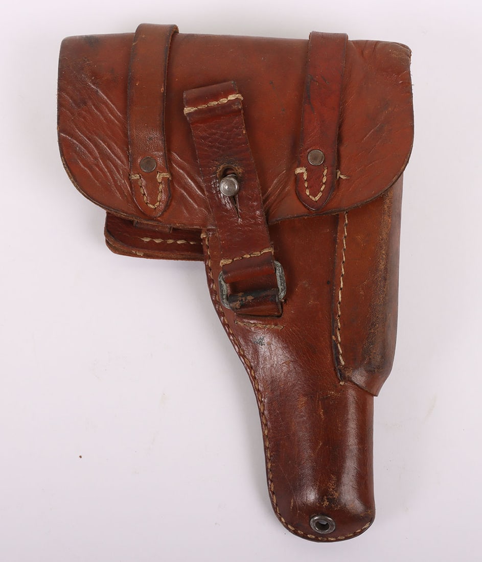WW2 German Luftwaffe Issue Holster for the FN Browning Model 1922 Pistol: WW2 German Luftwaffe Issue Holster for the FN Browning Model 1922 Pistol, fine example produced in dyed brown leather. With the securing strap having the squared off tip. Stamped to the reverse with �