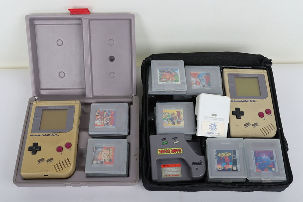 Two Gameboy Consoles with Games. (1 of 8)
