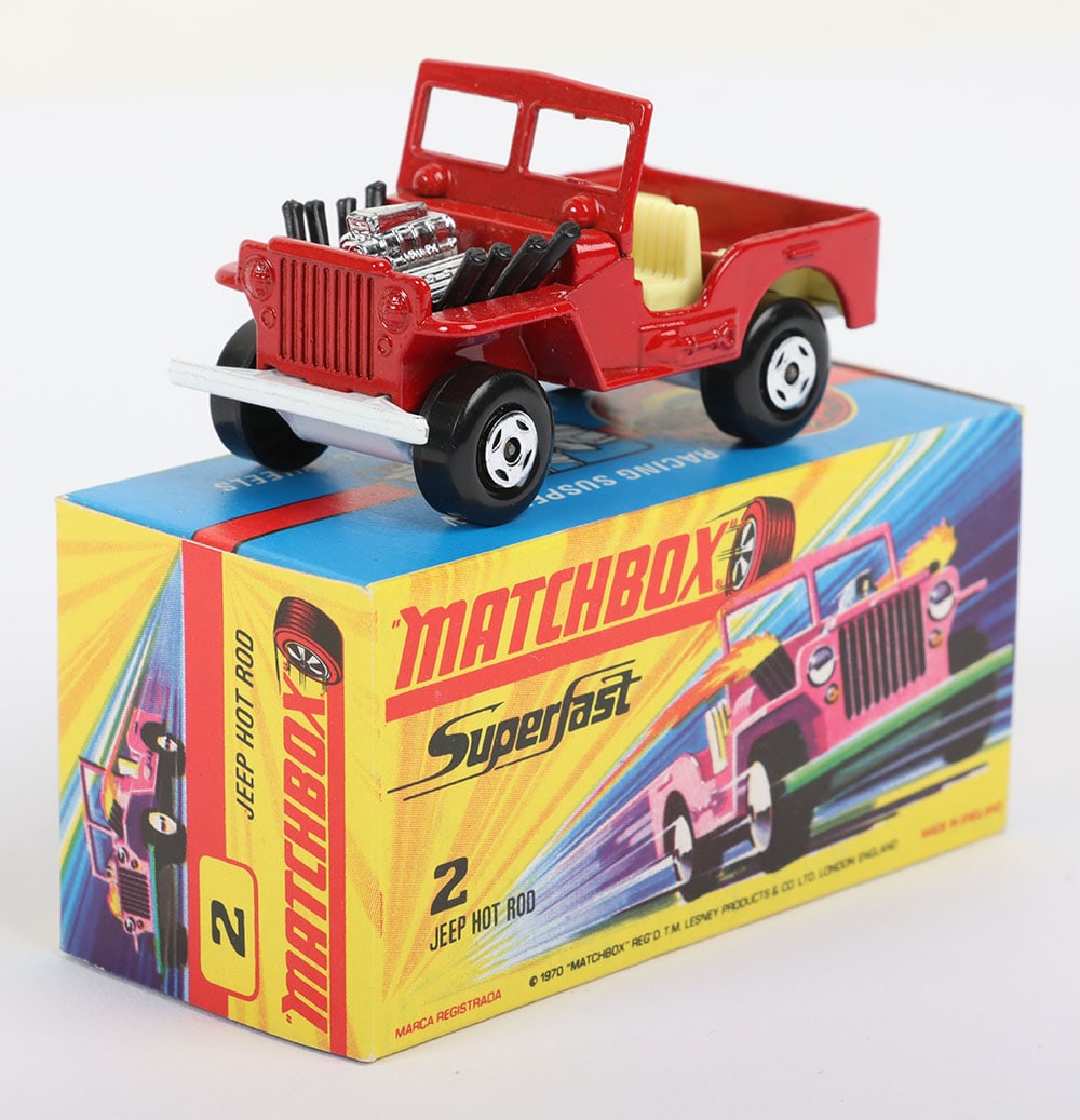 Matchbox Superfast 2b Jeep Hot Rod with scarcer RED body: Matchbox Superfast 2b Jeep Hot Rod with scarcer RED body and WHITE base, model is very near mint to mint in a mint I box WITHOUT NEW to faces