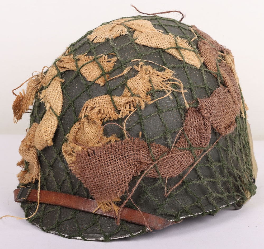Representation of a WW2 M2, D-Bale US Paratroopers Helmet: Representation of a WW2 M2, D-Bale US Paratroopers Helmet, This helmet in our opinion, has been assembled to represent the M2 D-bale US Paratroopers helmet as used in WW2. The Liner is of Belgium orig