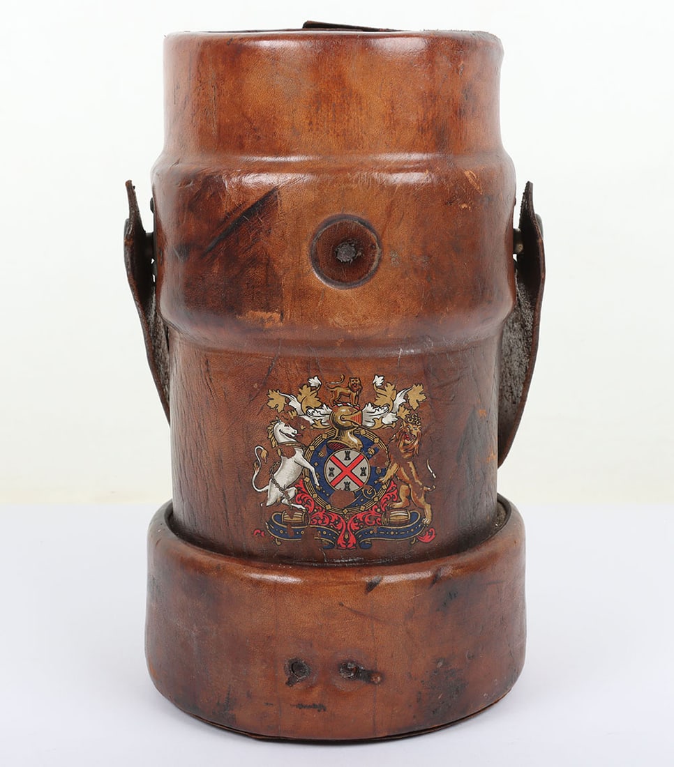 WW2 Shell Carrier: WW2 Shell Carrier: Brown leather carrier with coat of arms transfer to front, complete with heavy leather carry handle and stamped to base No 57 III B.H.& G.L.td 9-1944, overall, in good used conditio