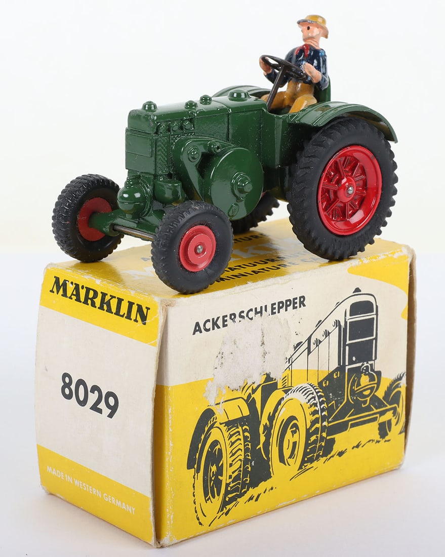 Marklin (Western Germany) 8029 Lanz Bulldog Tractor,: Marklin (Western Germany) 8029 Lanz Bulldog Tractor, green body, red wheel hubs, with driver, in near mint original condition, illustrated box is in excellent original condition.