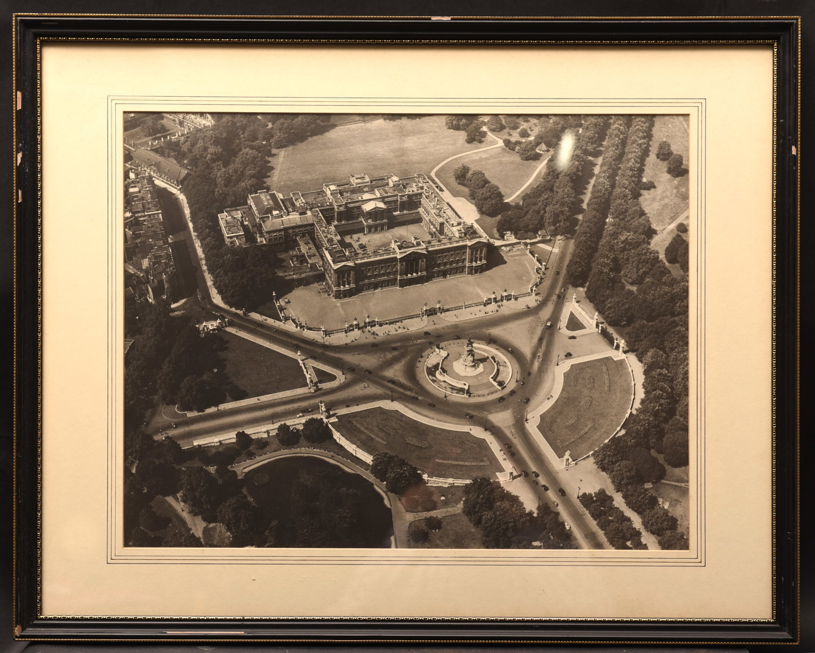 Royal Vista: Buckingham Palace from Above (Photo): This captivating aerial photograph, measuring 26" x 21", offers a unique perspective on Buckingham Palace, the iconic residence of the British monarchy. Taken from a vantage point high above London, t