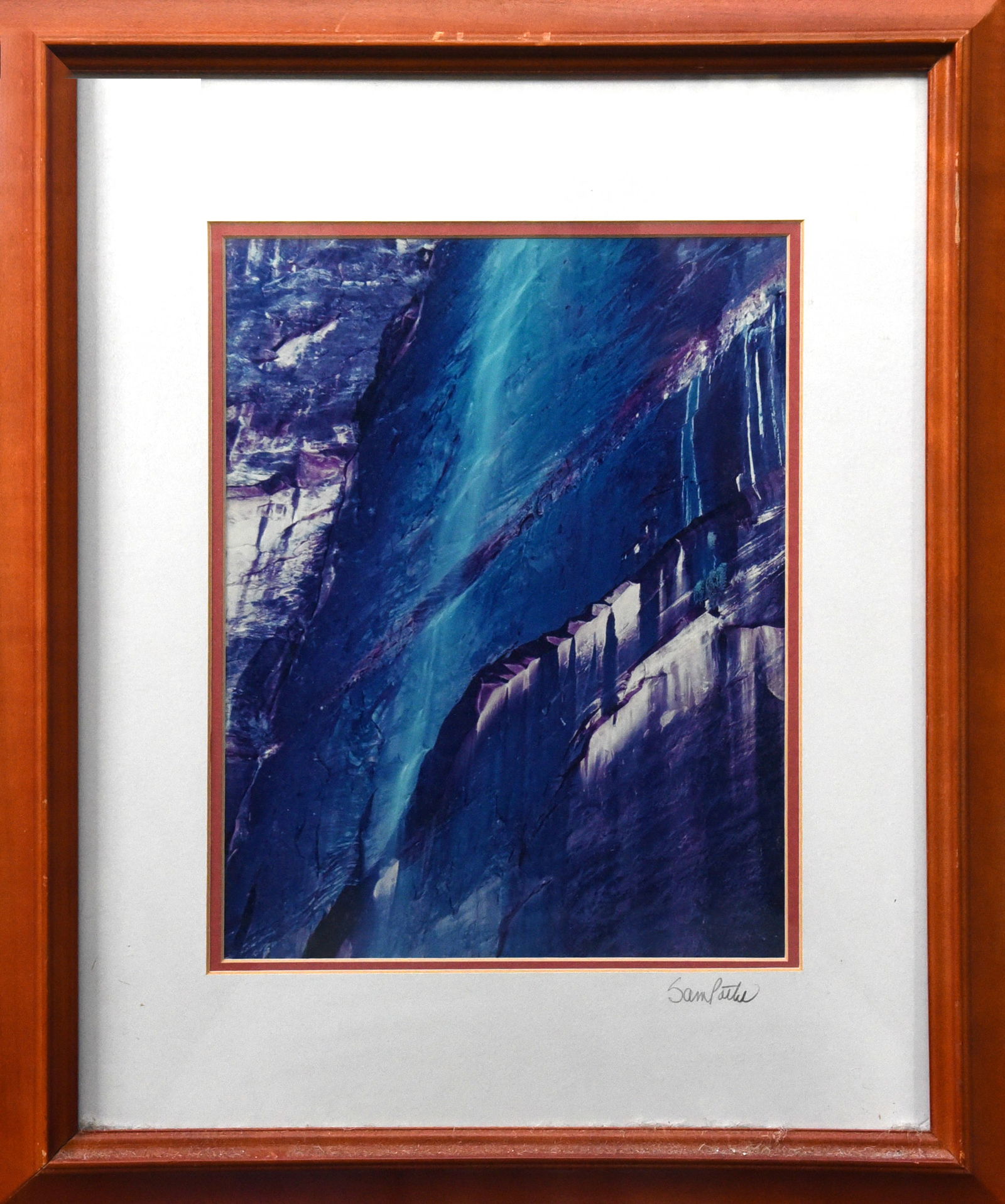 Blue Abstract Photo By Sam Pathi: Immerse yourself in the depths of blue with this abstract photograph by Sam Pathi. The image evokes a sense of flowing water or cascading light, creating a mesmerizing visual experience. Signed by