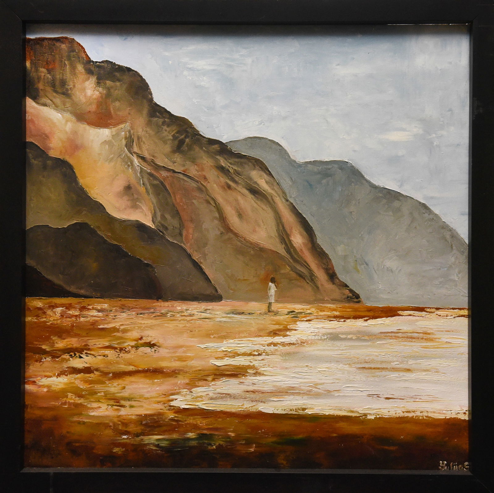 Solitary Shore By Yulias: Oil on board, 26" x 26", by Yulias. This landscape depicts a solitary figure standing on a beach, gazing out at distant mountains across a wide expanse of water. The artist's use of warm earth tones