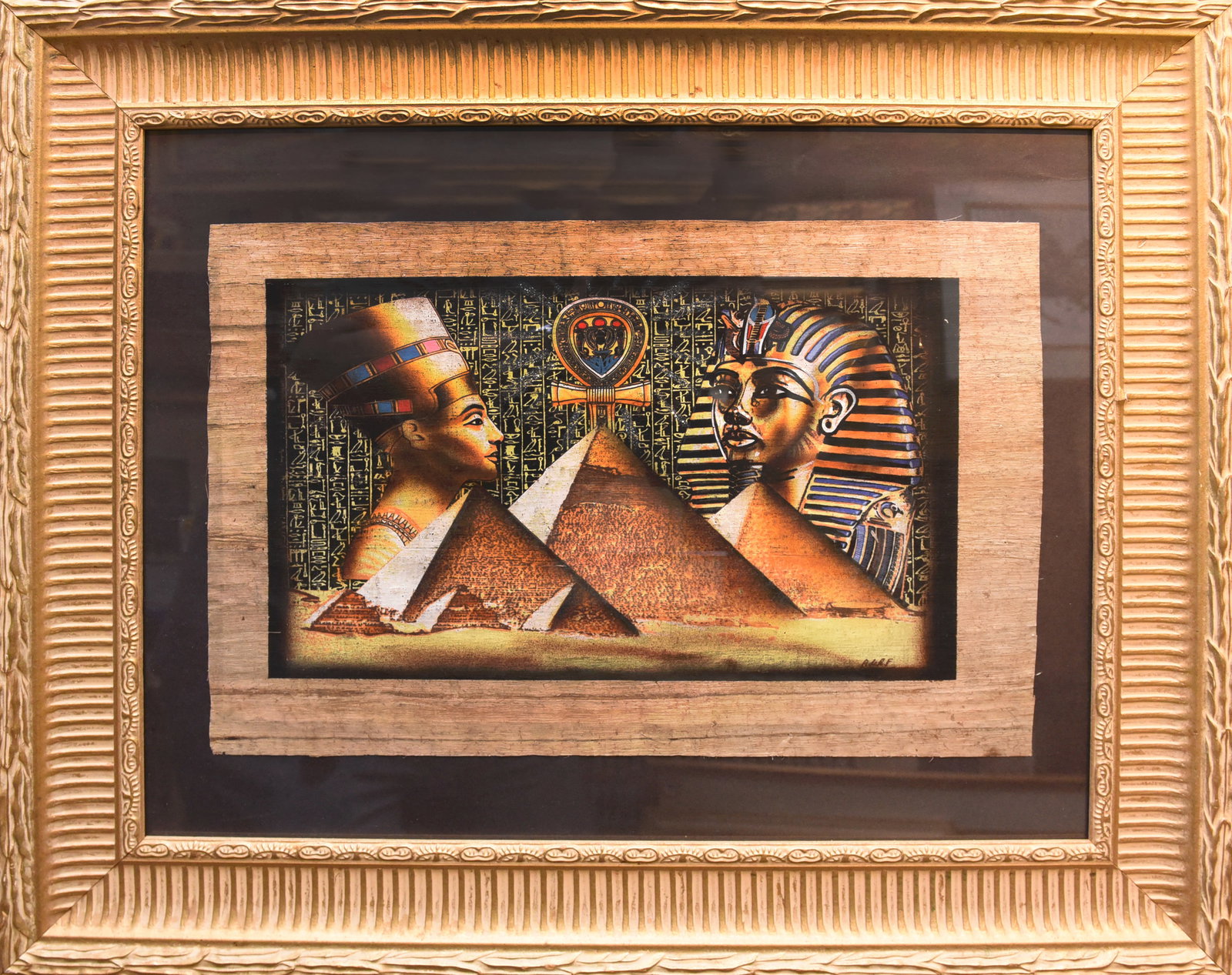 Echoes of Eternity: Nefertiti & Tutankhamun Papyrus Art: Capture the splendor of ancient Egypt with this captivating papyrus artwork featuring the legendary Nefertiti and Tutankhamun. Measuring 26" x 22", this piece beautifully depicts the iconic queen and