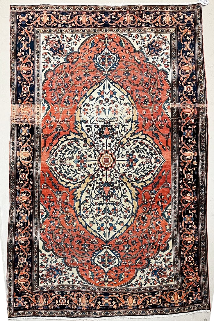 Fine Antique Persian Farahan Sarouk Rug in Rich Colors, 4'4" x 6'8": This antique Persian Farahan Sarouk rug (4'4" x 6'8") is a magnificent example of the artistry and quality associated with Persian carpets. Handwoven in Persia, it features a dense pile and a captivat