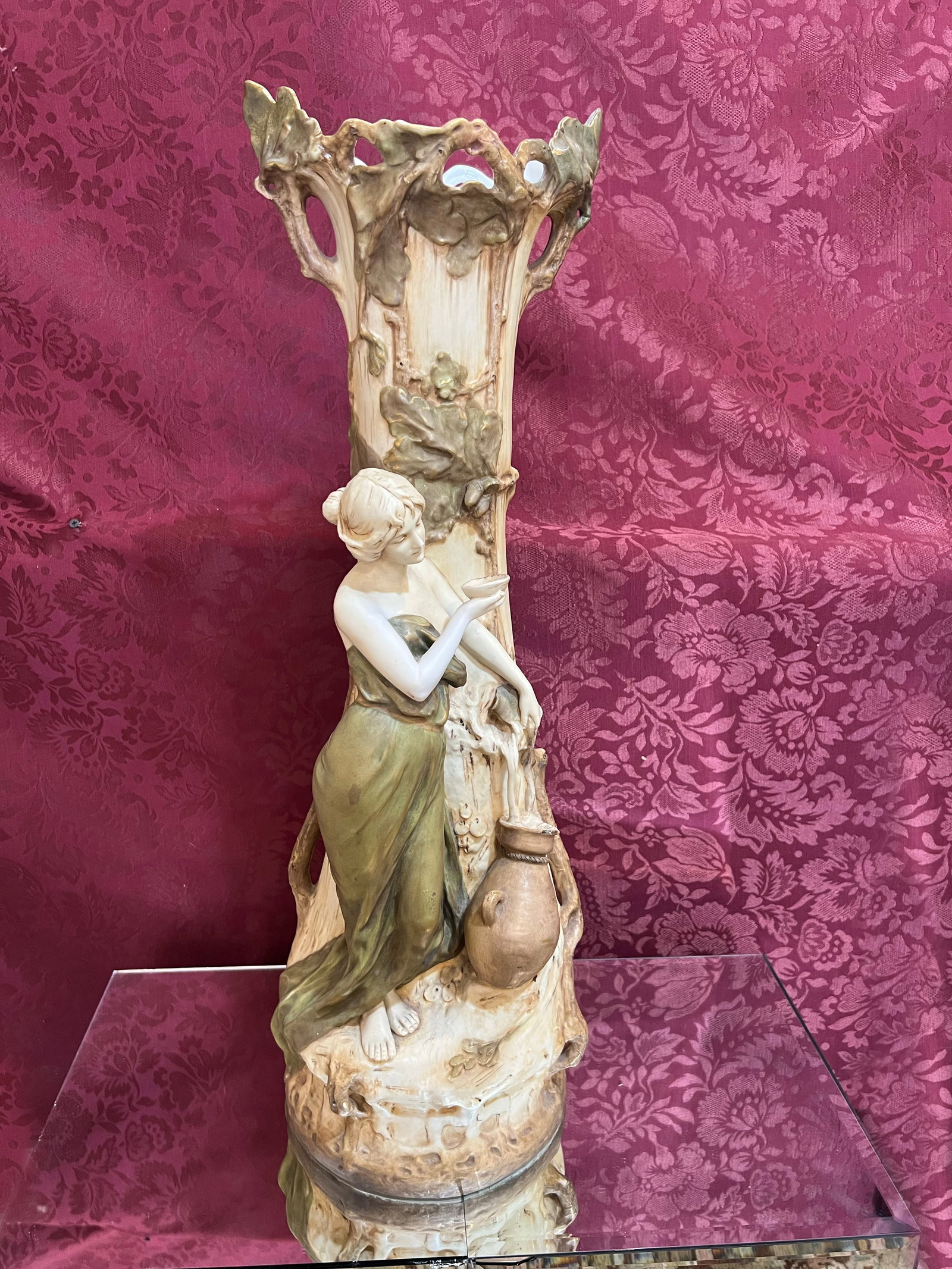 Art Nouveau Royal Dux Bohemia Porcelain Vase: This exquisite and rare Art Nouveau porcelain sculpture, measuring 29" x 10", is a quintessential example of early 20th-century craftsmanship from the renowned Royal Dux Bohemia factory. The piece sea