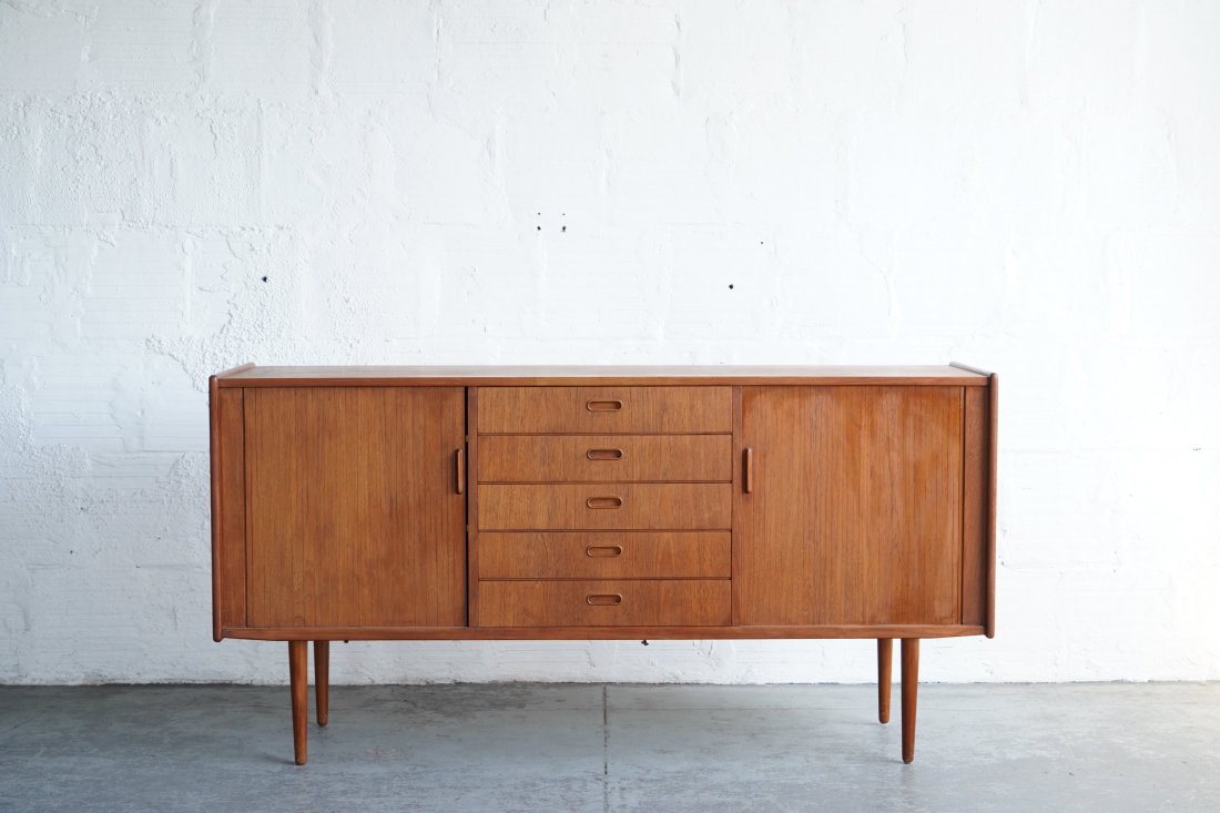 Tambour Door Credenza By Arne Vodder: Stunning Teak Tambour door credenza designed by Arne Vodder in Denmark, 1960s. Dimensions: 67"L | 18.5"D | 34"H.