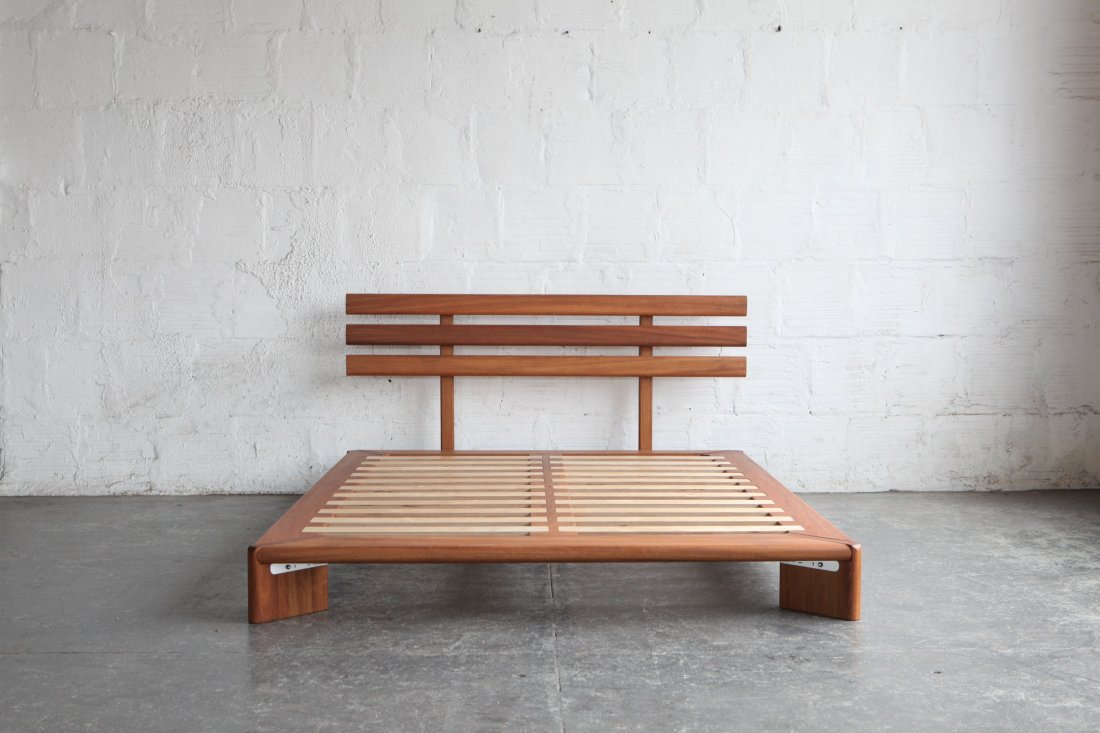 Timber Bed: Designed and fabricated by Spencer Staley of The Good Mod, located in Portland, OR. Dimensions: 80"L | 60"W | 9"H | 31" Headboard Height. Material: Hardwood, Birch Plywood, Powder Coated Steel.