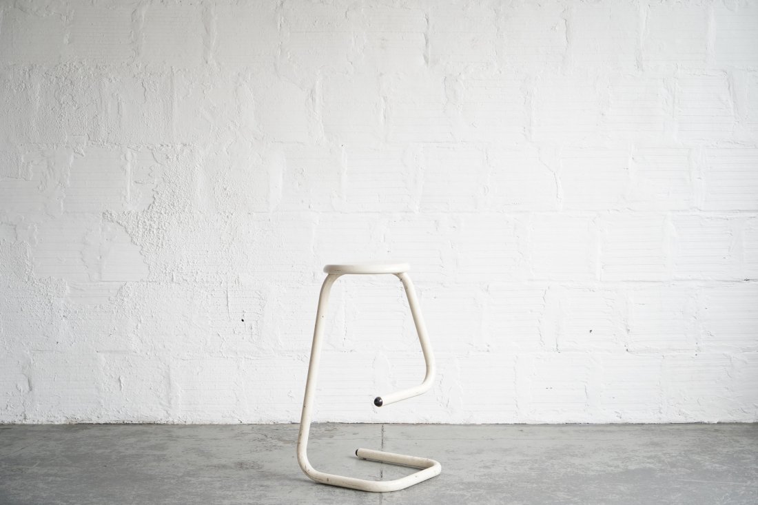 Paperclip Post Modern Bar Stool: Iconic, off-white, steel post modern bar stool designed by Les Industries Amisco in 1960s Canada. Dimensions: 16"D | 15"W | 30"H.