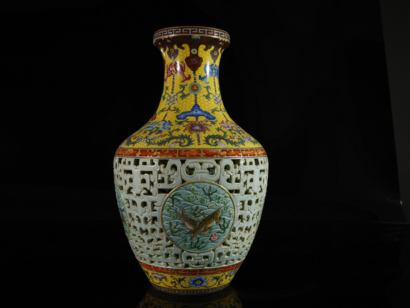 A Rare and Fine Enamelled Yangcai Reticulated 'Fish' (1 of 11)