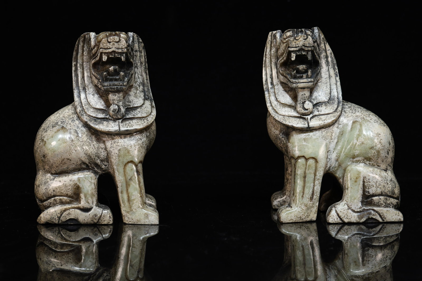 A Pair of Ancient Jade Lions: A Pair of Ancient Jade LionsChinese Han DynastySize:17cmX11cmX9.5cm