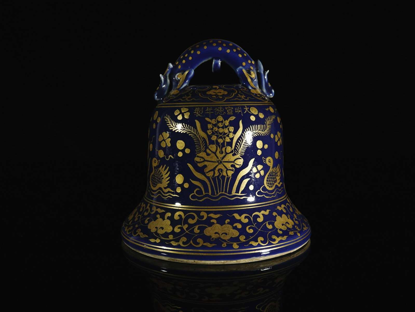 A Fine Blue Glazed Gold-painted 'Flower' Ornament: A Fine Blue Glazed Gold-painted 'Flower' Ornament Chinese Ming Dynasty Mark of Xuande Six-character and of the Period(1426-1435) Size:17cmx18.5cm