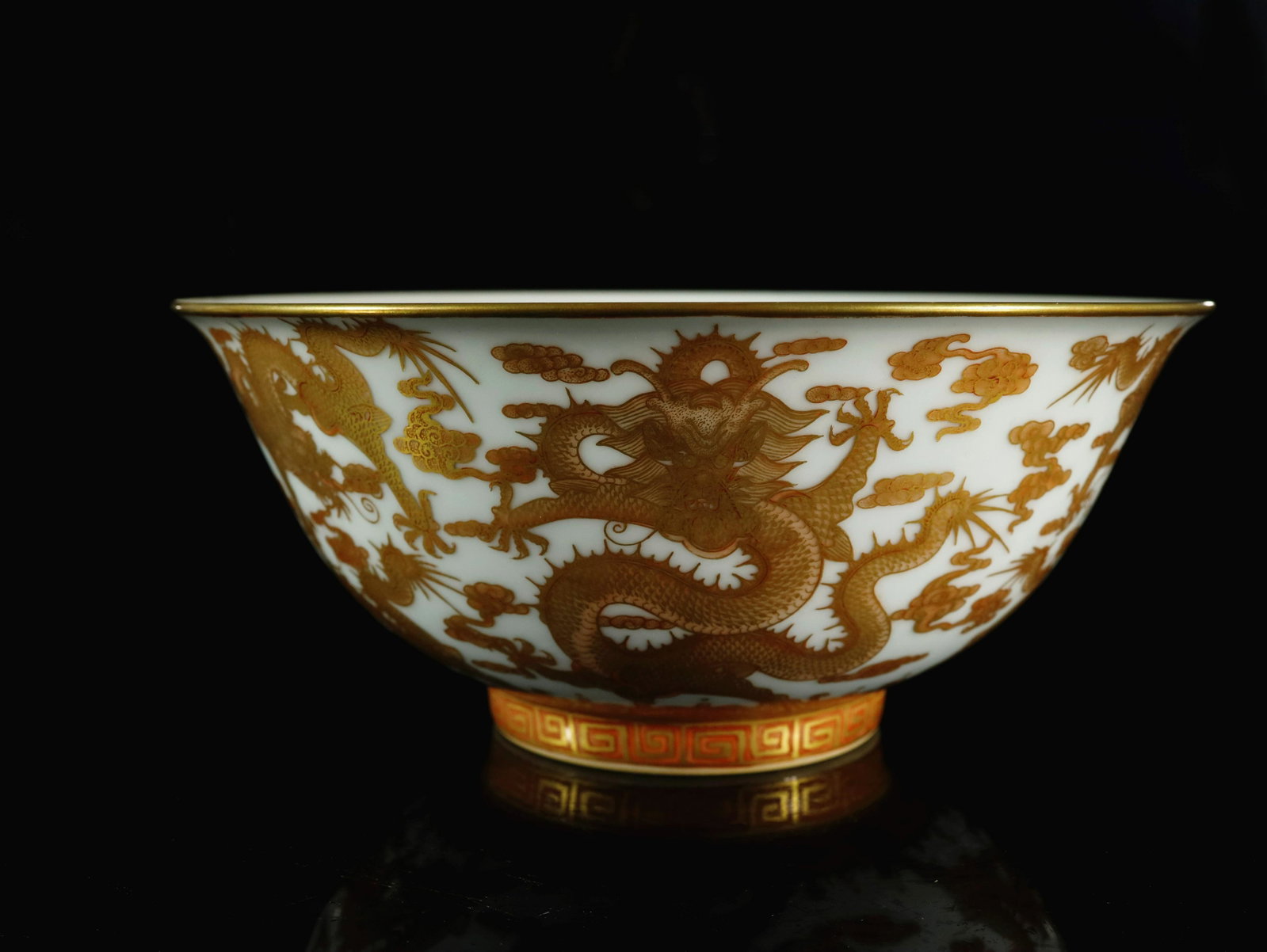 An Unique Gilt-decorated Dragon Pattern Bowl: An Unique Gilt-decorated Dragon Pattern Bowl Chinese Qing Dynasty Mark of Qianlong Six-character and of the Period(1736-1795) Size:20.3cmx9cm