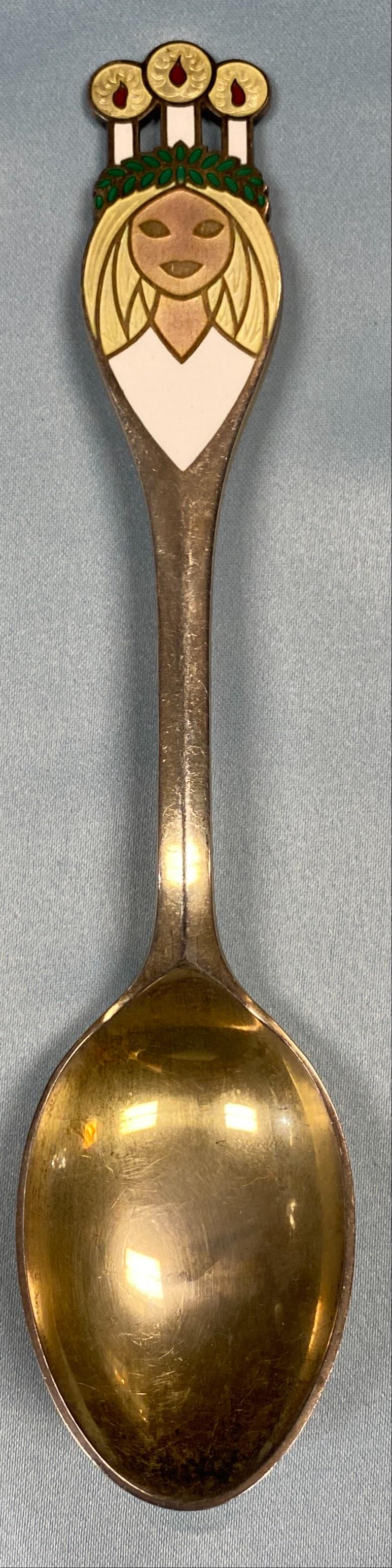 1959 Christmas Themed Spoon Sterling Silver: Danish sterling silver gilt Christmas spoon for 1959, The Lucia Bride, in Green, yellow, white, red enamel by A. Michelsen of Copenhagen, Denmark. Dimensions: Spoon Length 6.25" &