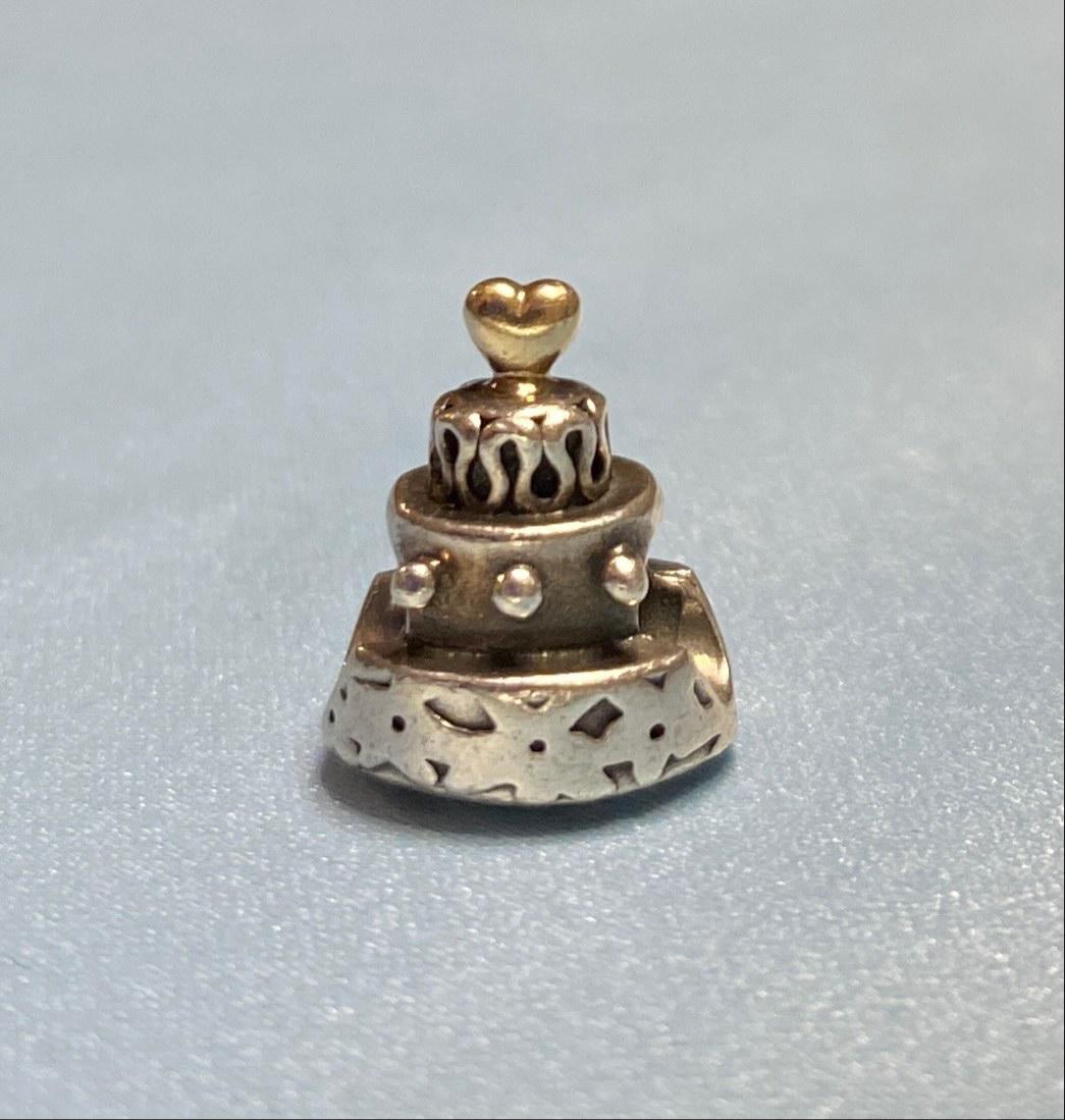 Sterling and 14k Pandora Retired Charm: Sterling Silver and 14k Pandora retired Birthday Cake Charm