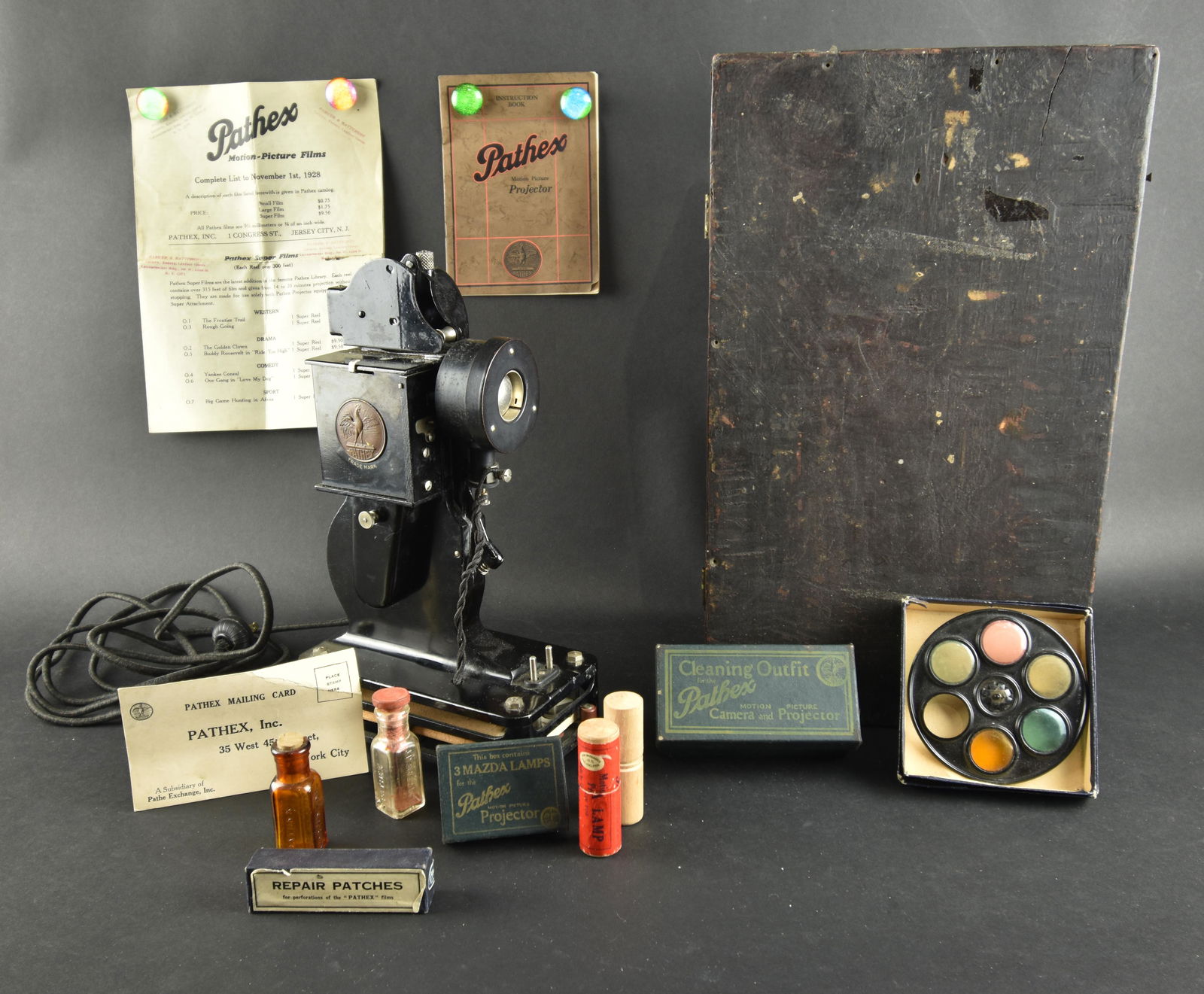 1920’s 9.5mm projector with accessories, box, and (1 of 6)
