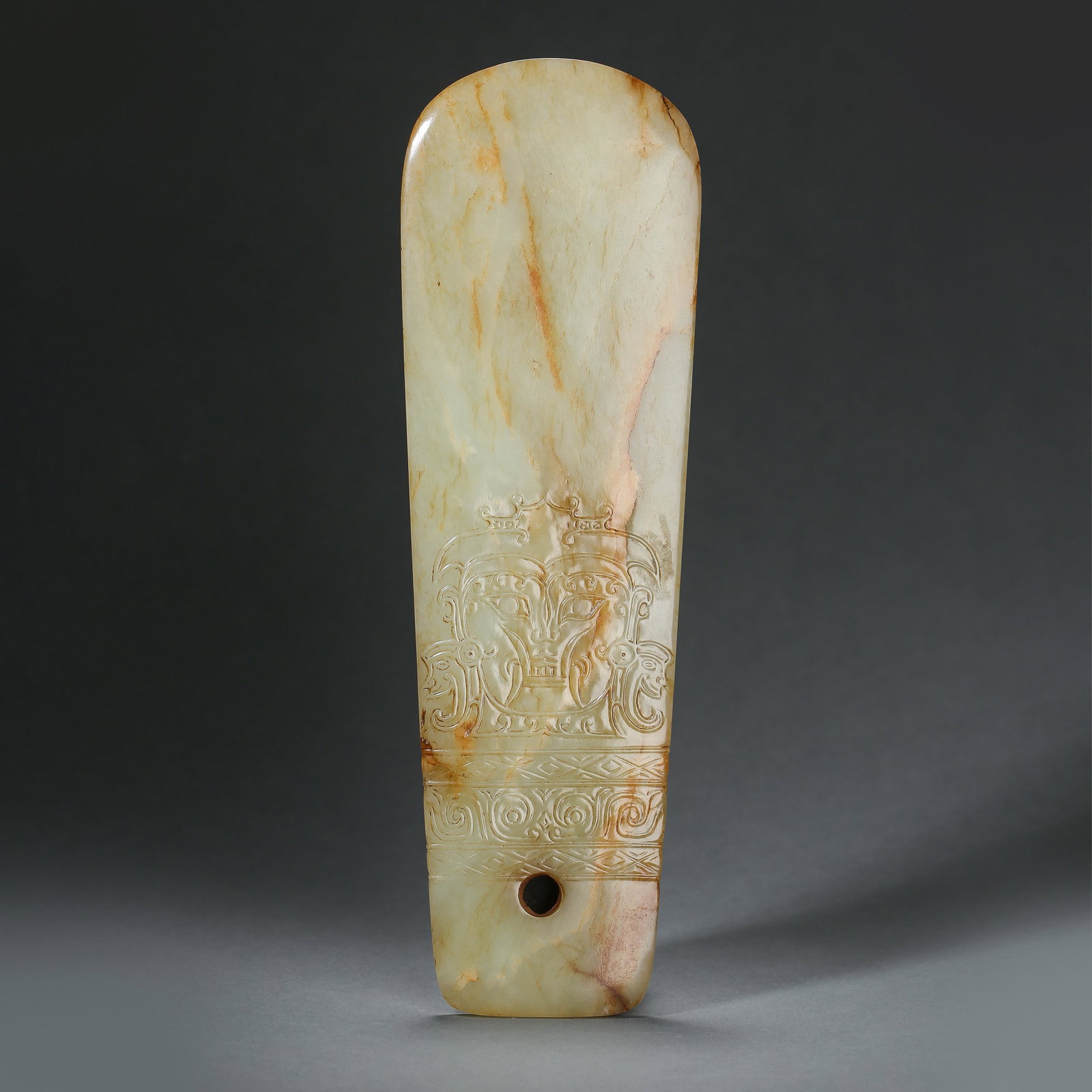 ANCIENT CHINESE HETIAN JADE AXE: ANCIENT CHINESE HETIAN JADE AXE H. 23.2 cm. W. 7.2 cm. Weight 291 gram.