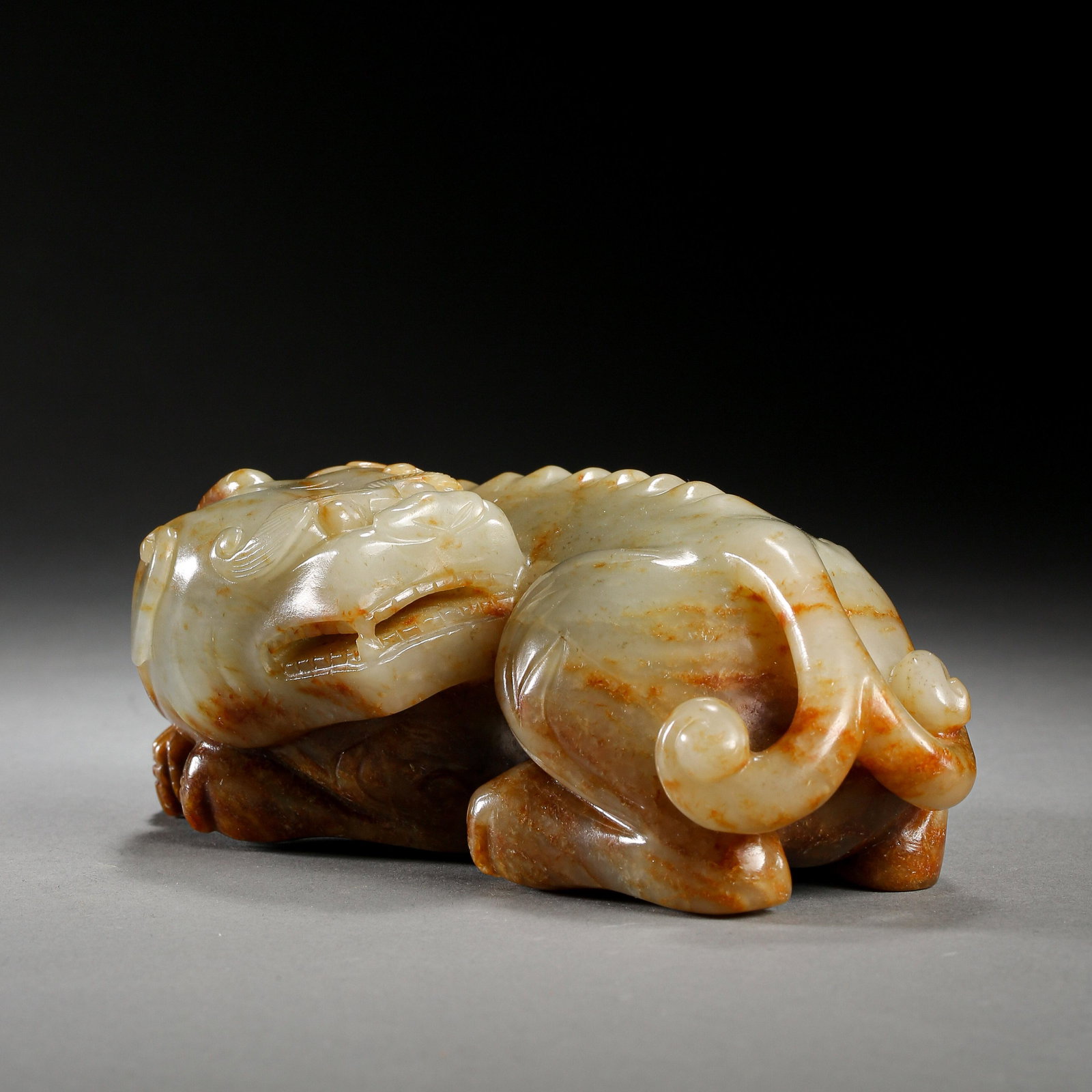 MING DYNASTY, CHINESE HETIAN JADE BEAST: MING DYNASTY, CHINESE HETIAN JADE BEAST H. 4.95 cm. W. 13.8 cm. Weight 694 gram.